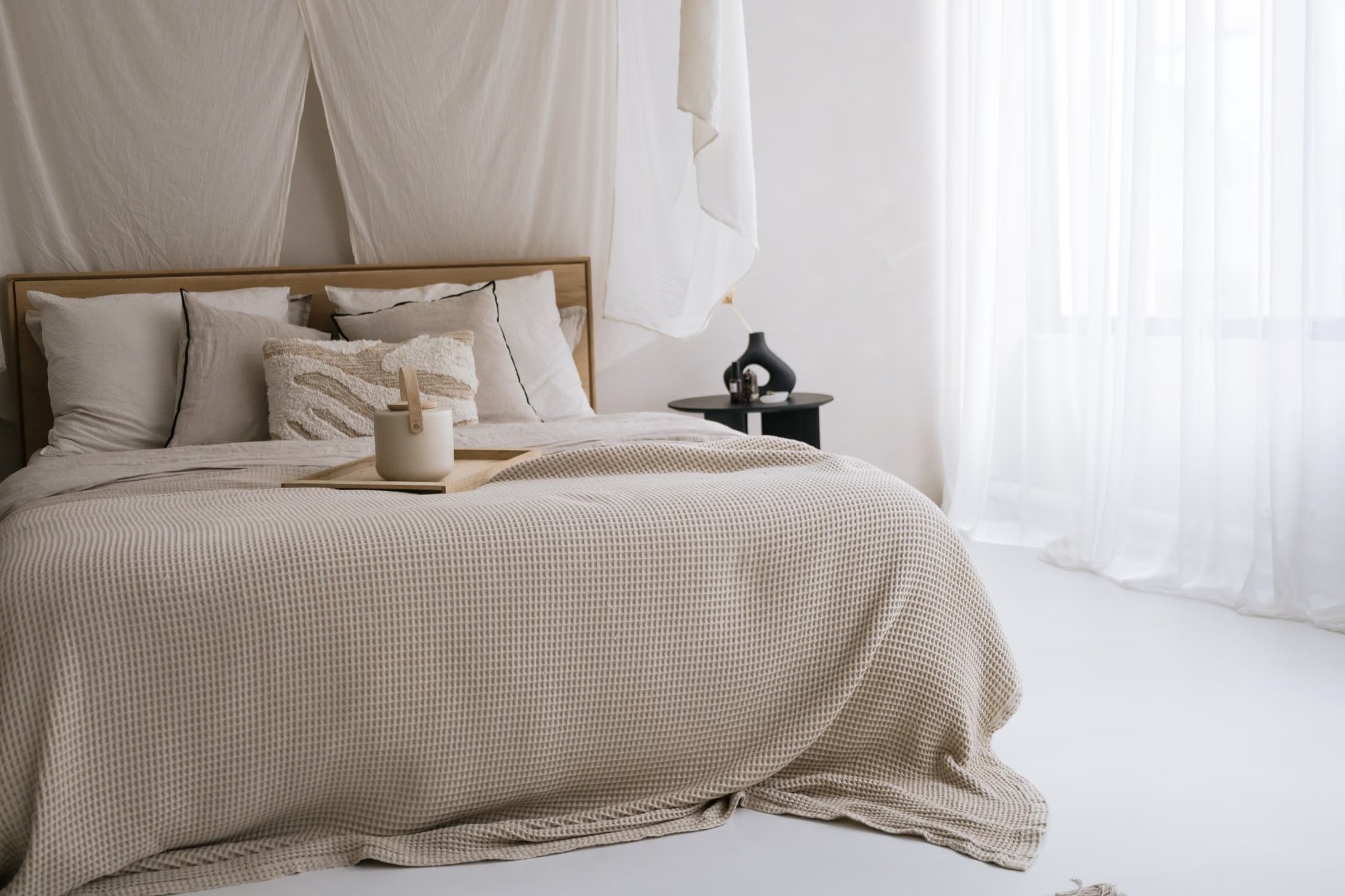 A calm bedroom with natural light