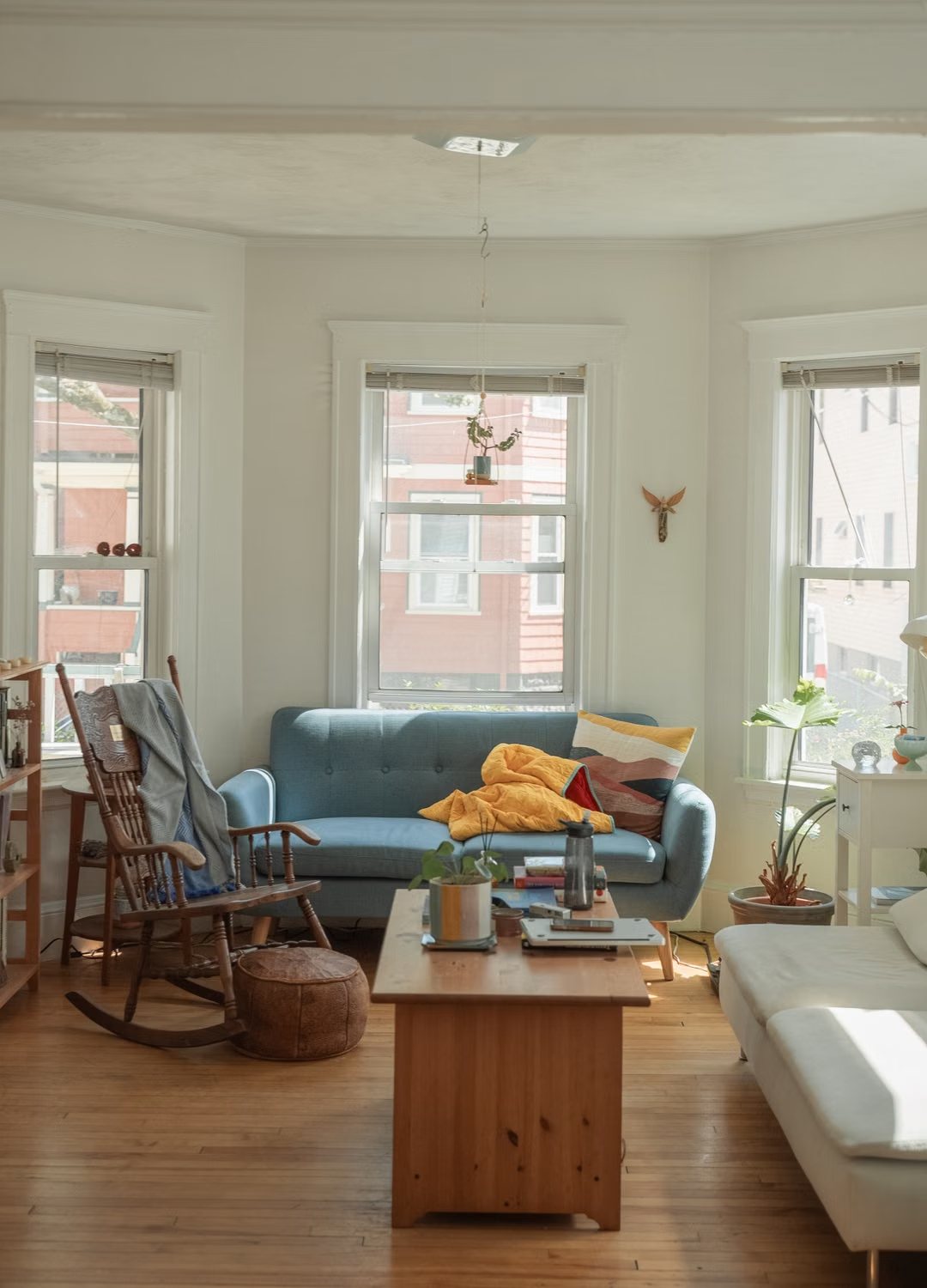 A welcoming sitting room with a blue sofa