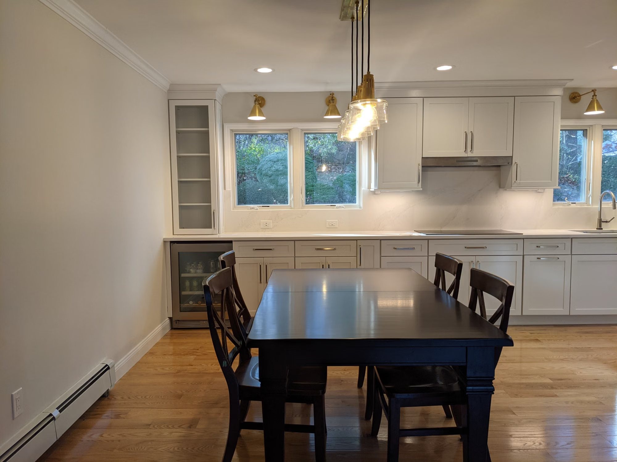 A bright kitchen and dining table